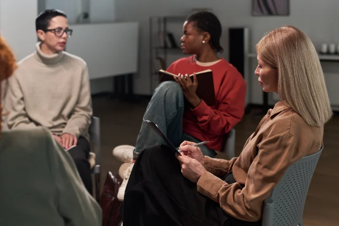 Researchers discussing at a conference